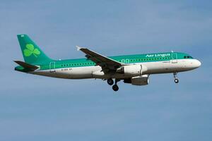 Aer Lingus Airbus A320 EI-DES passenger plane landing at Frankfurt Airport photo