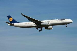 Lufthansa Airbus A330-300 D-AIKB passenger plane landing at Frankfurt Airport photo