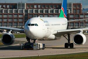 Air Namibia passenger plane at airport. Schedule flight travel. Aviation and aircraft. Air transport. Global international transportation. Fly and flying. photo