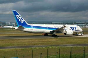 All Nippon Airways Boeing 787-8 Dreamliner JA822A passenger plane taxiing at Frankfurt airport photo