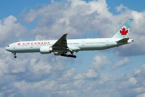 Air Canada Boeing 777-300ER C-FIVS passenger plane landing at Frankfurt airport photo