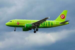 S7 Airlines passenger plane at airport. Schedule flight travel. Aviation and aircraft. Air transport. Global international transportation. Fly and flying. photo