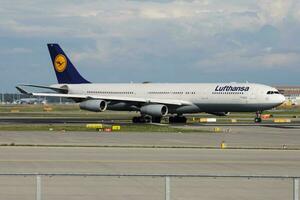 Lufthansa Airbus A340-300 D-AIGO passenger plane departure at Frankfurt airport photo