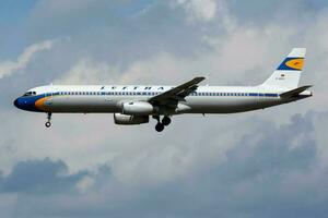 Lufthansa special retro livery Airbus A321 D-AIDV passenger plane landing at Frankfurt Airport photo