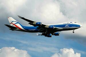 CargoLogicAir cargo plane at airport. Air freight shipping. Aviation and aircraft. Air transport. Global international transportation. Fly and flying. photo