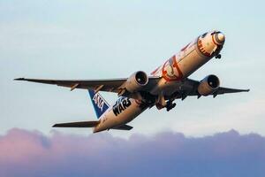 ANA All Nippon Airways passenger plane at airport. Schedule flight travel. Aviation and aircraft. Air transport. Global international transportation. Fly and flying. photo