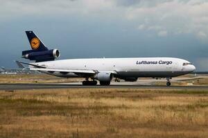 Lufthansa cargo plane at airport. Air freight shipping. Aviation and aircraft. Air transport. Global international transportation. Fly and flying. photo
