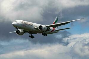 Emirates SkyCargo cargo plane at airport. Air freight shipping. Aviation and aircraft. Air transport. Global international transportation. Fly and flying. photo