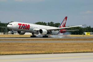 LATAM TAM Airlines passenger plane at airport. Schedule flight travel. Aviation and aircraft. Air transport. Global international transportation. Fly and flying. photo