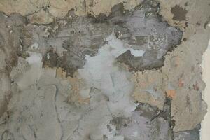 Cracked and abstract grunge texture. Aged material surface backdrop. Weathered effect pattern. Old and dirty background. photo