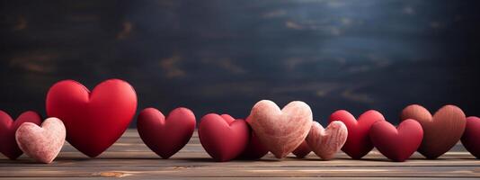 Image of red and pink Hearts on table focus of hearts with dark best background wallpaper with copy space for brother love. Valentines day concept. photo