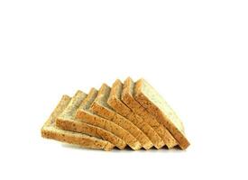 Whole wheat bread sliced isolated on a white background photo