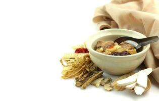 Close up of medicine soup with pork photo