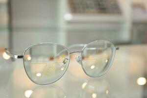 Glasses progressive lens, close-up of eyeglass photo