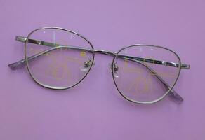 Close-up of glasses, eyeglass progressive lenses photo