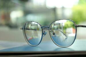 Close-up of glasses, eyeglass progressive lenses photo