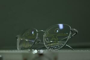 Close-up of glasses, eyeglass progressive lenses photo