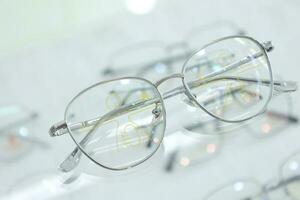 Eyeglass in optical shop, glasses progressive lens photo