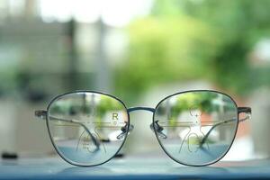 Close-up of glasses, eyeglass progressive lenses photo