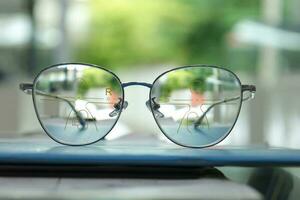 Close-up of glasses, eyeglass progressive lenses photo