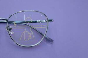 Close-up of glasses, eyeglass progressive lenses photo