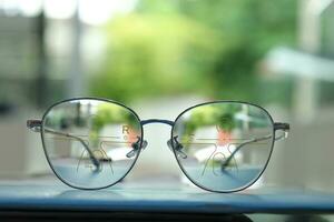 Close-up of glasses, eyeglass progressive lenses photo