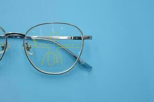 Close-up of glasses, eyeglass progressive lenses photo