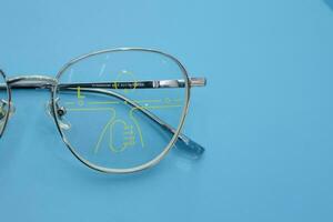 Close-up of glasses, eyeglass progressive lenses photo