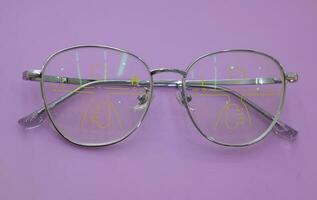 Close-up of glasses, eyeglass progressive lenses photo