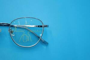 Close-up of glasses, eyeglass progressive lenses photo