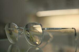 Close-up of glasses, eyeglass progressive lenses photo