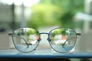 Close-up of glasses, eyeglass progressive lenses photo