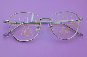 Close-up of glasses, eyeglass progressive lenses photo