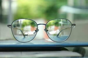 Close-up of glasses, eyeglass progressive lenses photo