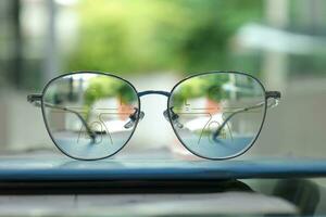 Close-up of glasses, eyeglass progressive lenses photo