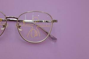 Close-up of glasses, eyeglass progressive lenses photo