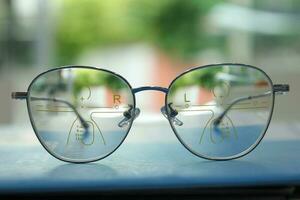 Close-up of glasses, eyeglass progressive lenses photo