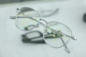 Eyeglass in optical shop, glasses progressive lens photo