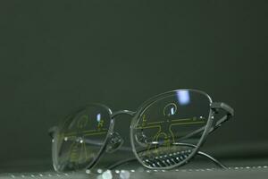 Close-up of glasses, eyeglass progressive lenses photo