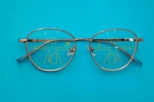 Close-up of glasses, eyeglass progressive lenses photo