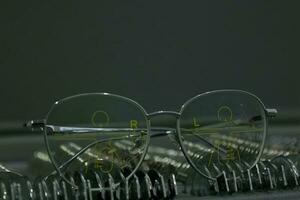 Close-up of glasses, eyeglass progressive lenses photo