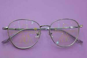 Close-up of glasses, eyeglass progressive lenses photo