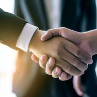 Businessmen making handshake with partner, greeting, dealing, merger and acquisition, business cooperation concept, for business, finance and investment background, teamwork and successful business photo