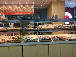 Samarinda Kalimantan Timur, Indonesia 05 July 2023. view of pastry shop selling bread in supermarket photo