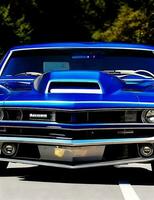 photo a blue and black muscle car with the license plate that says trans on the front.