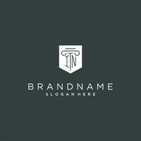 IN monogram with pillar and shield logo design, luxury and elegant logo for legal firm vector