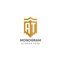 Monogram AT logo with shield geometric shape, elegant luxury initial logo design vector