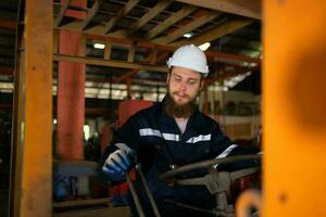 Engineer checks the operation of the forklift truck after the repair is completed. photo