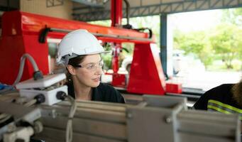 Electrical engineer with the mission of installing a robot arm electrical system photo