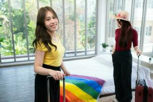 A homestay in the countryside, a natural attraction Welcome LGBT couples by cover a rainbow flag on the mattress in a bedroom overlooking natural beauty. photo